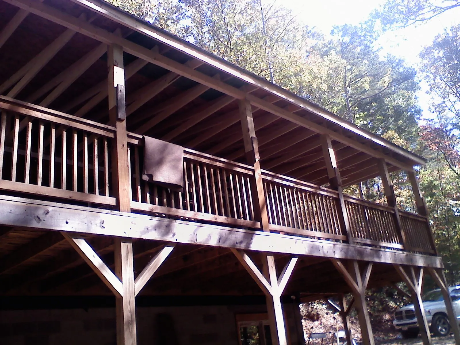 Timber framing under a new elevated porch and deck — Roof Leak Repair in Yarmouth Port by Roofing Brothers